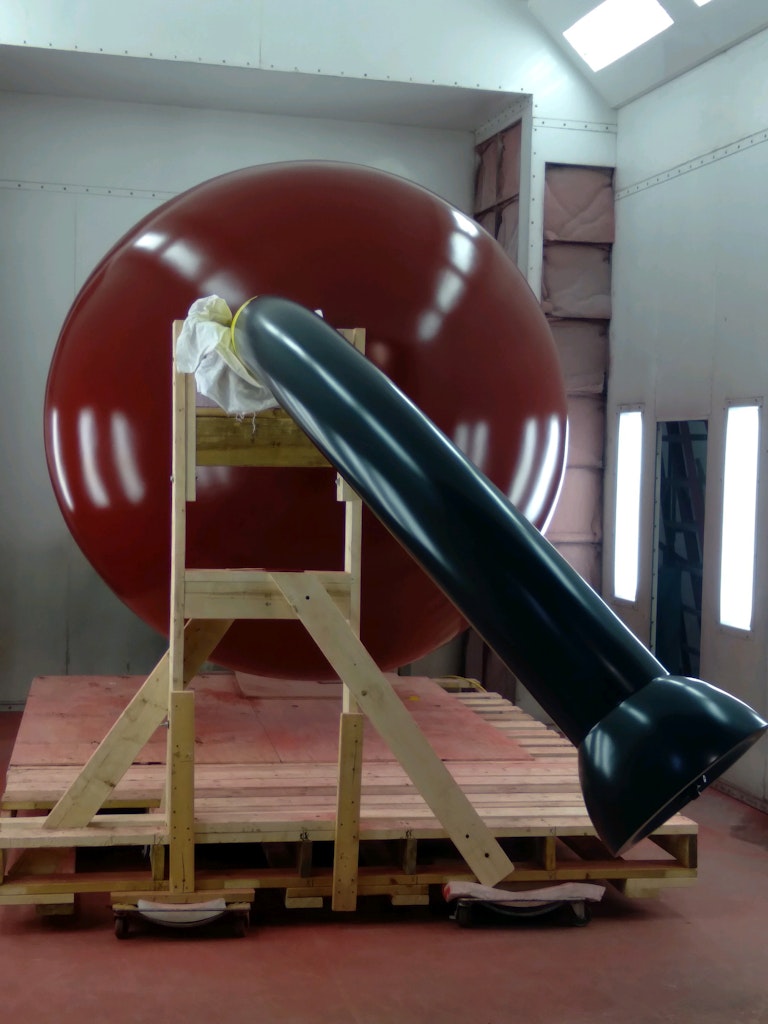 Freshly painted red and black cherry flipped on side