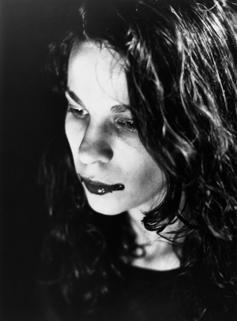 black and white of women with blood on lips