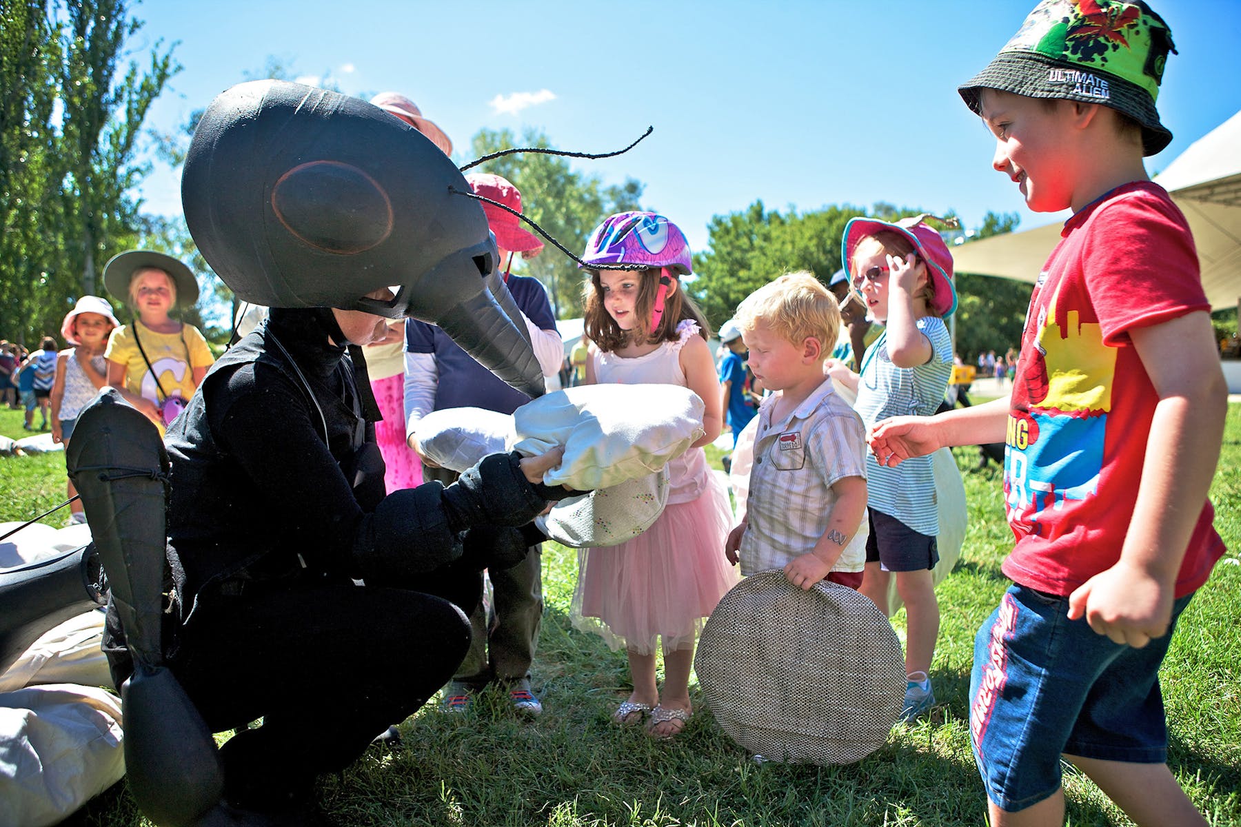 Member of Polyglot Theatre playing with kids