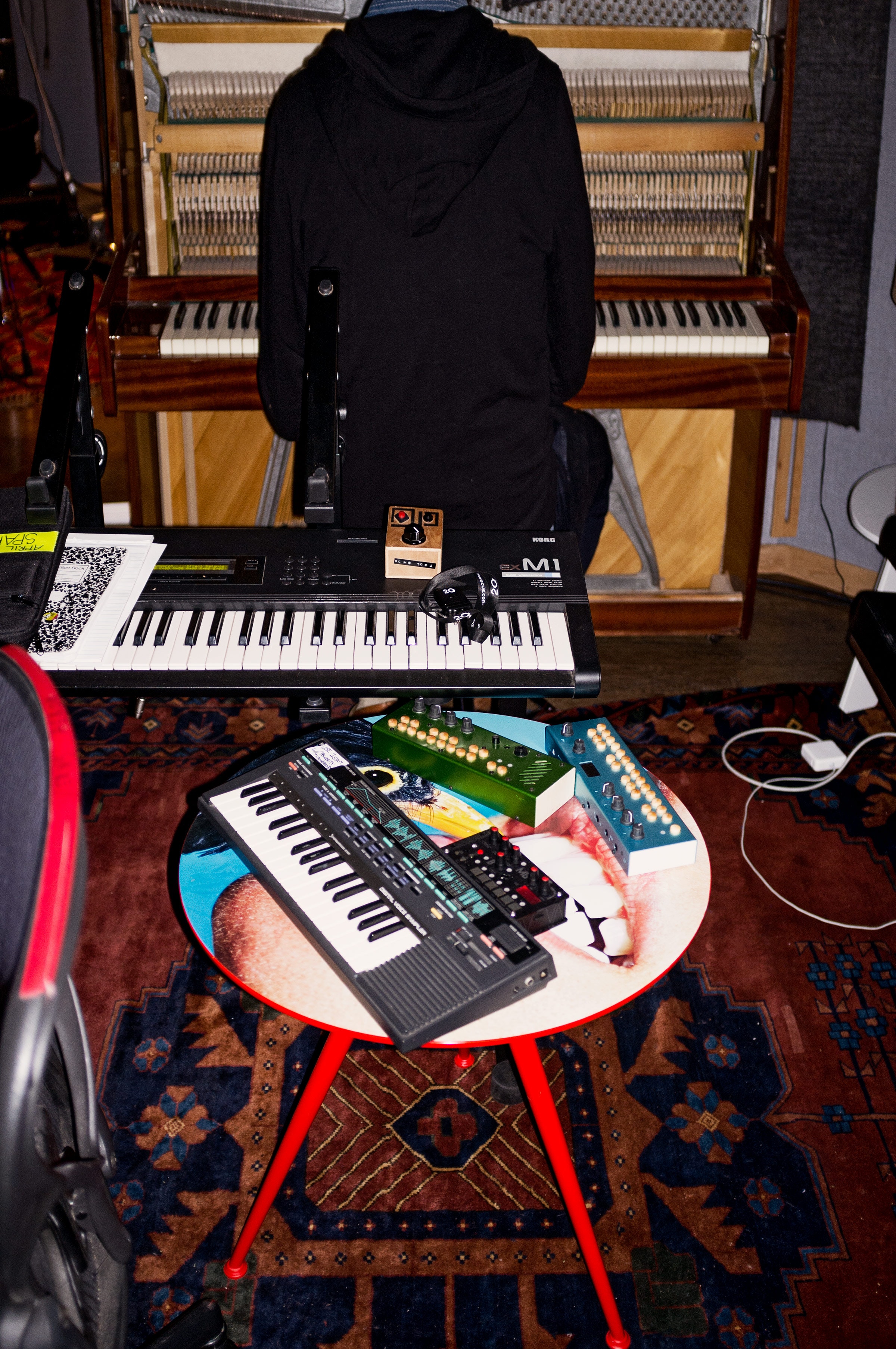 man sitting at piano