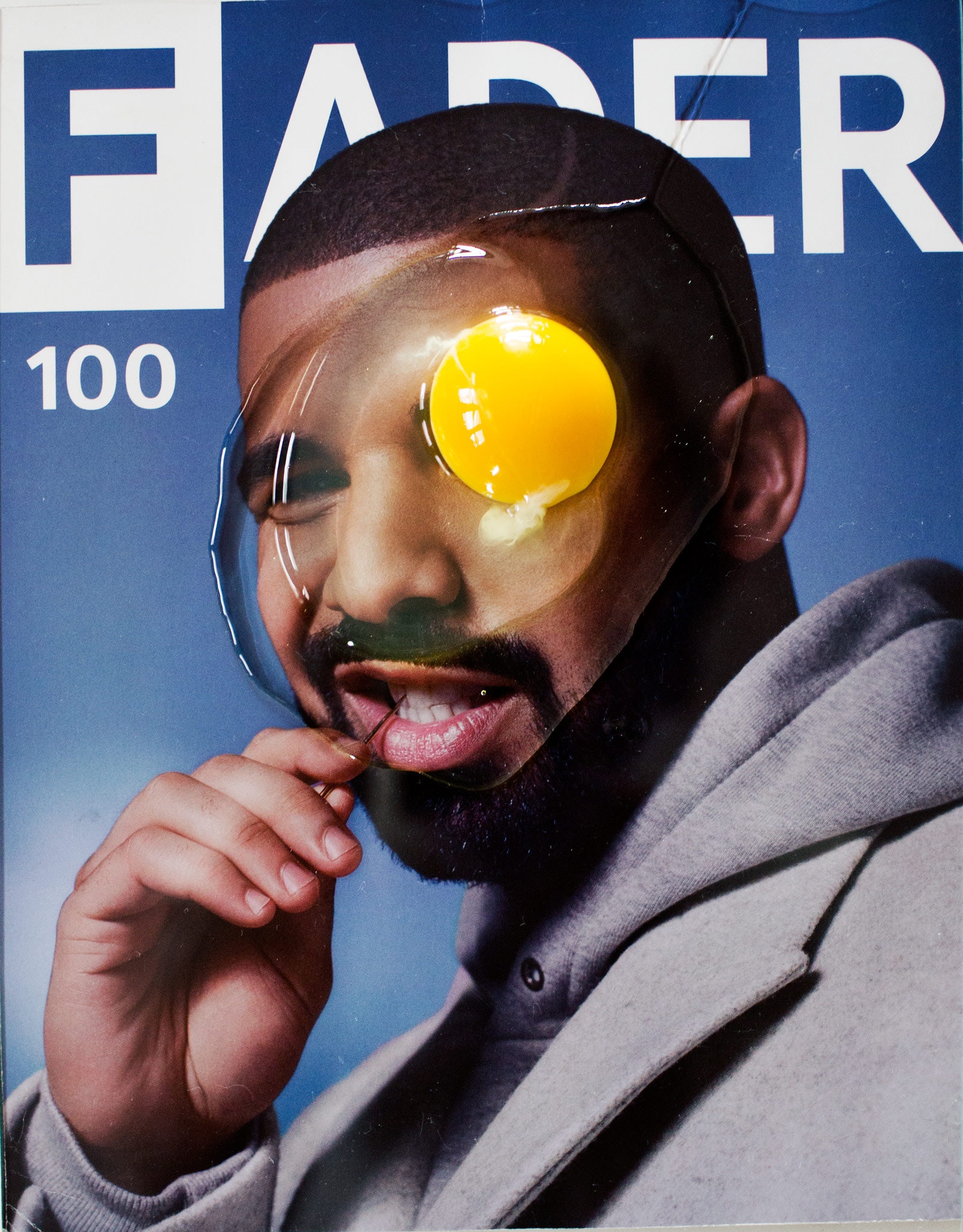 magazine cover of man with egg on his face