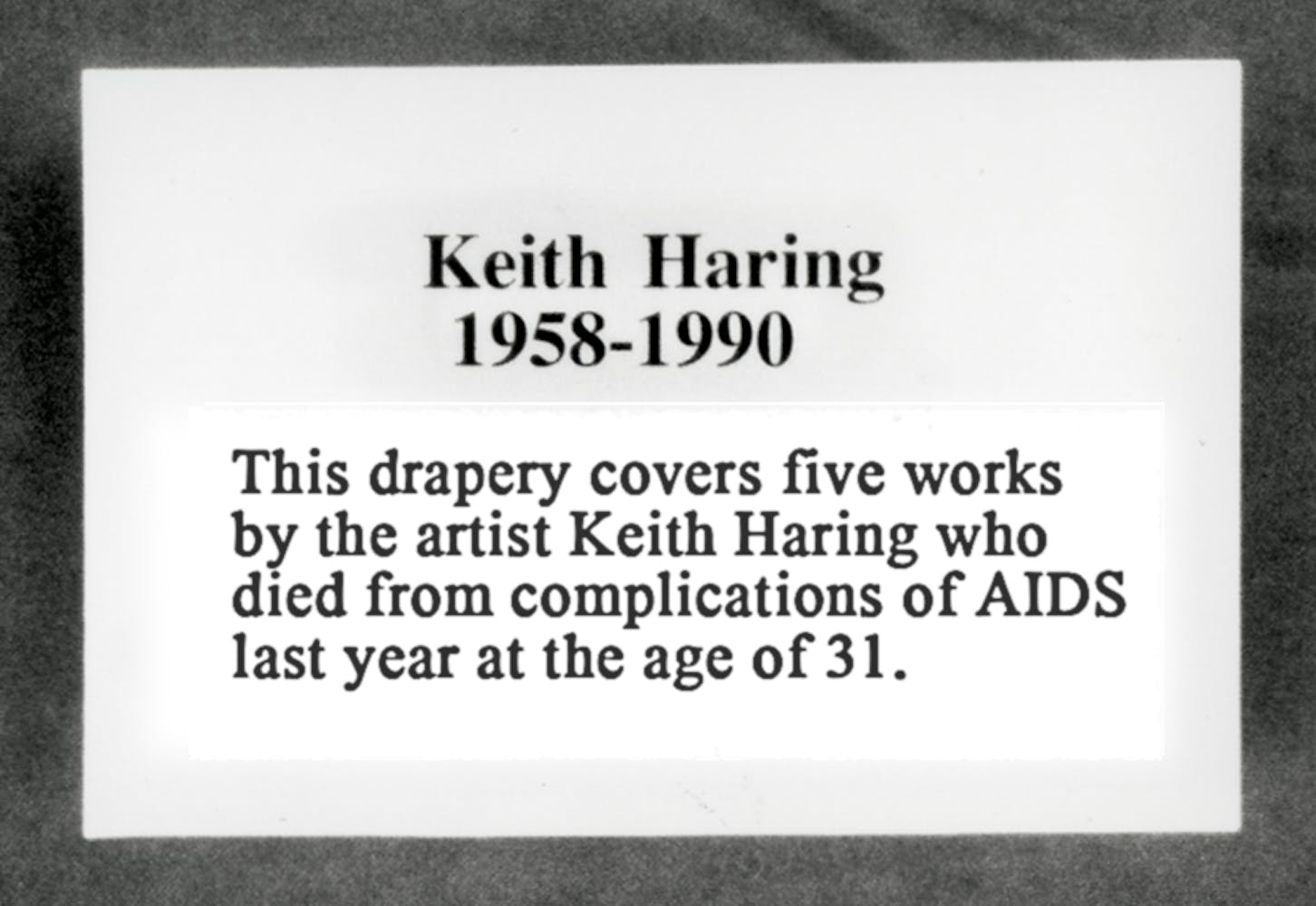 A photo of a plaque that reads: Keith Haring 1958-1990