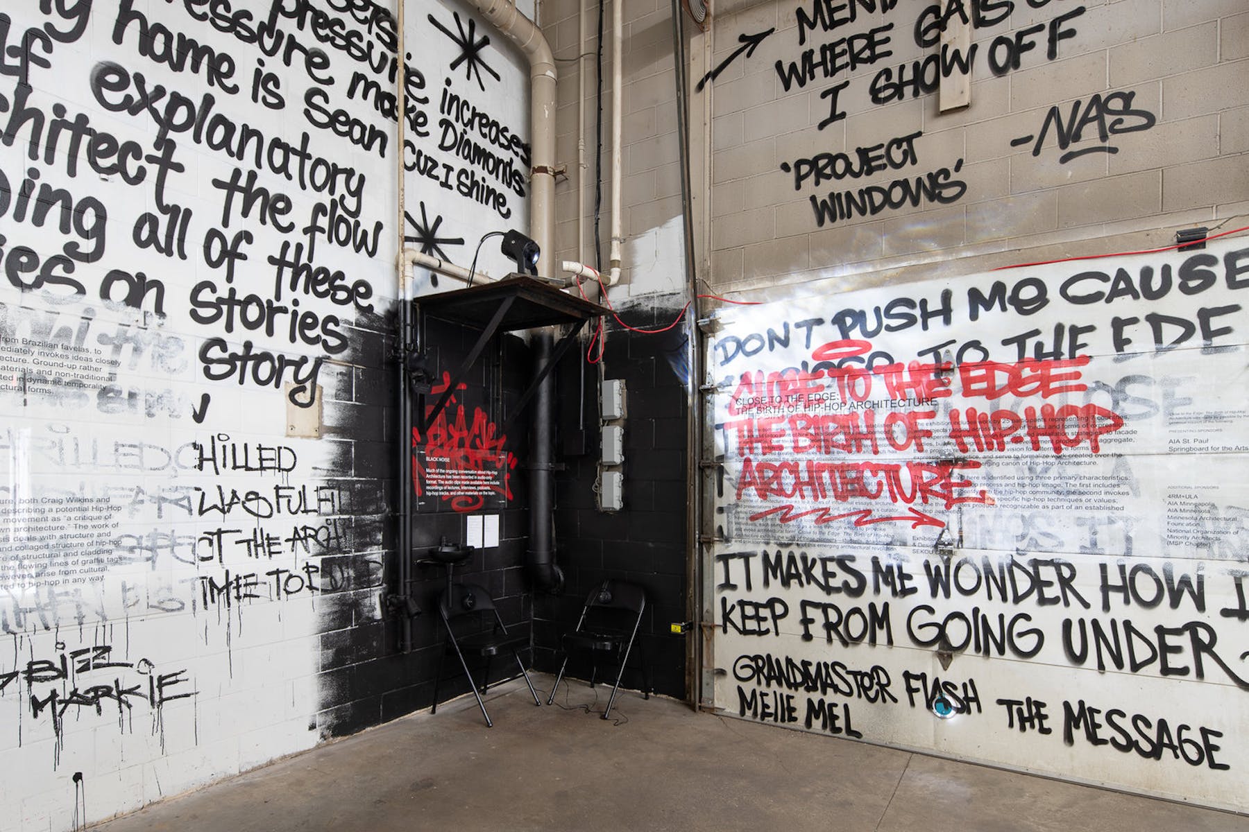 Walls covered with graffiti describing the concept of hip-hop architecture
