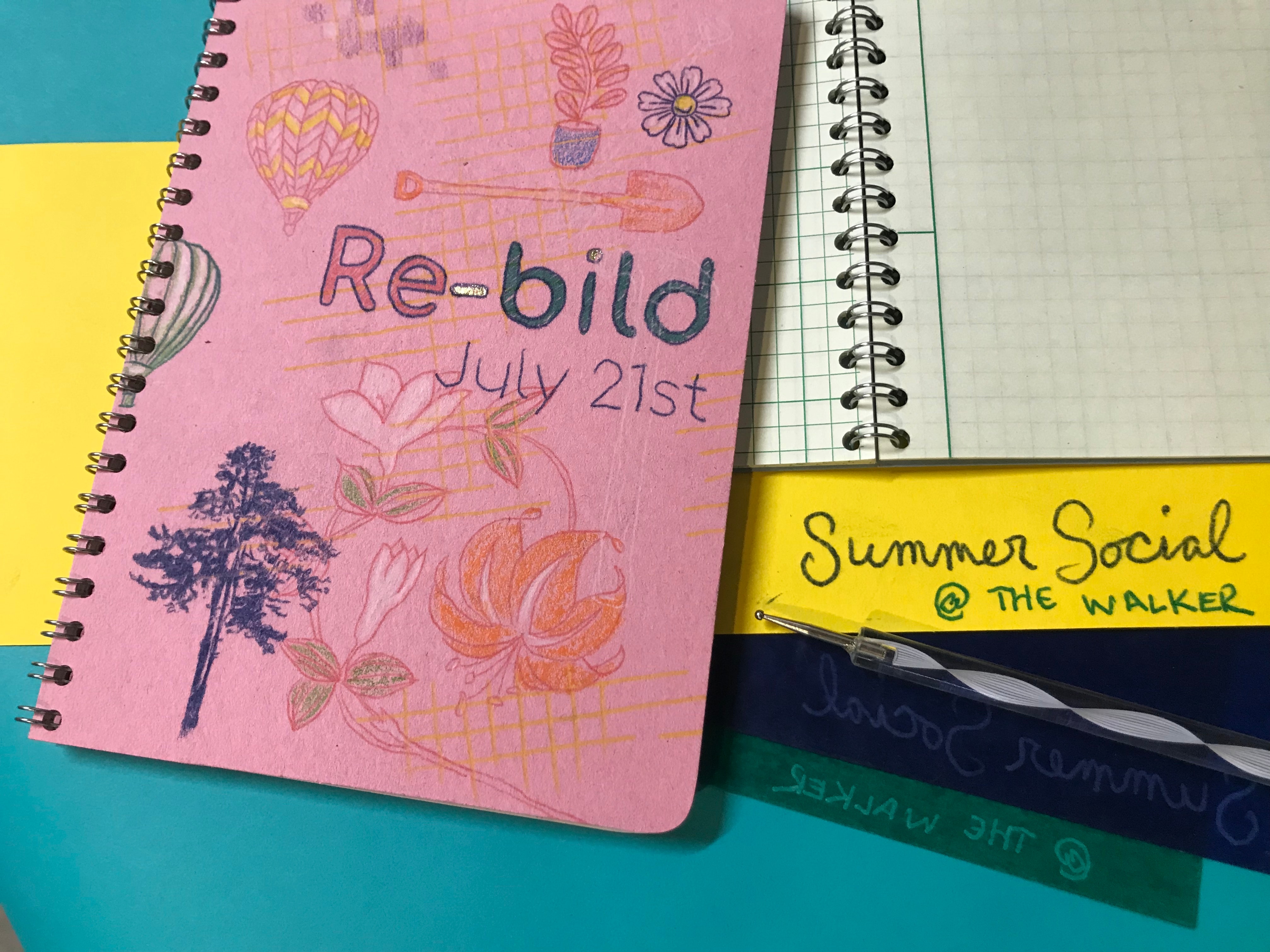 A pile of notebooks with sketches and doodles on them.