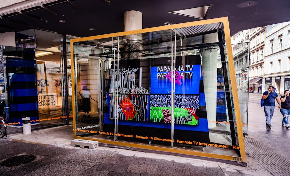 Installation with monitors in a public square