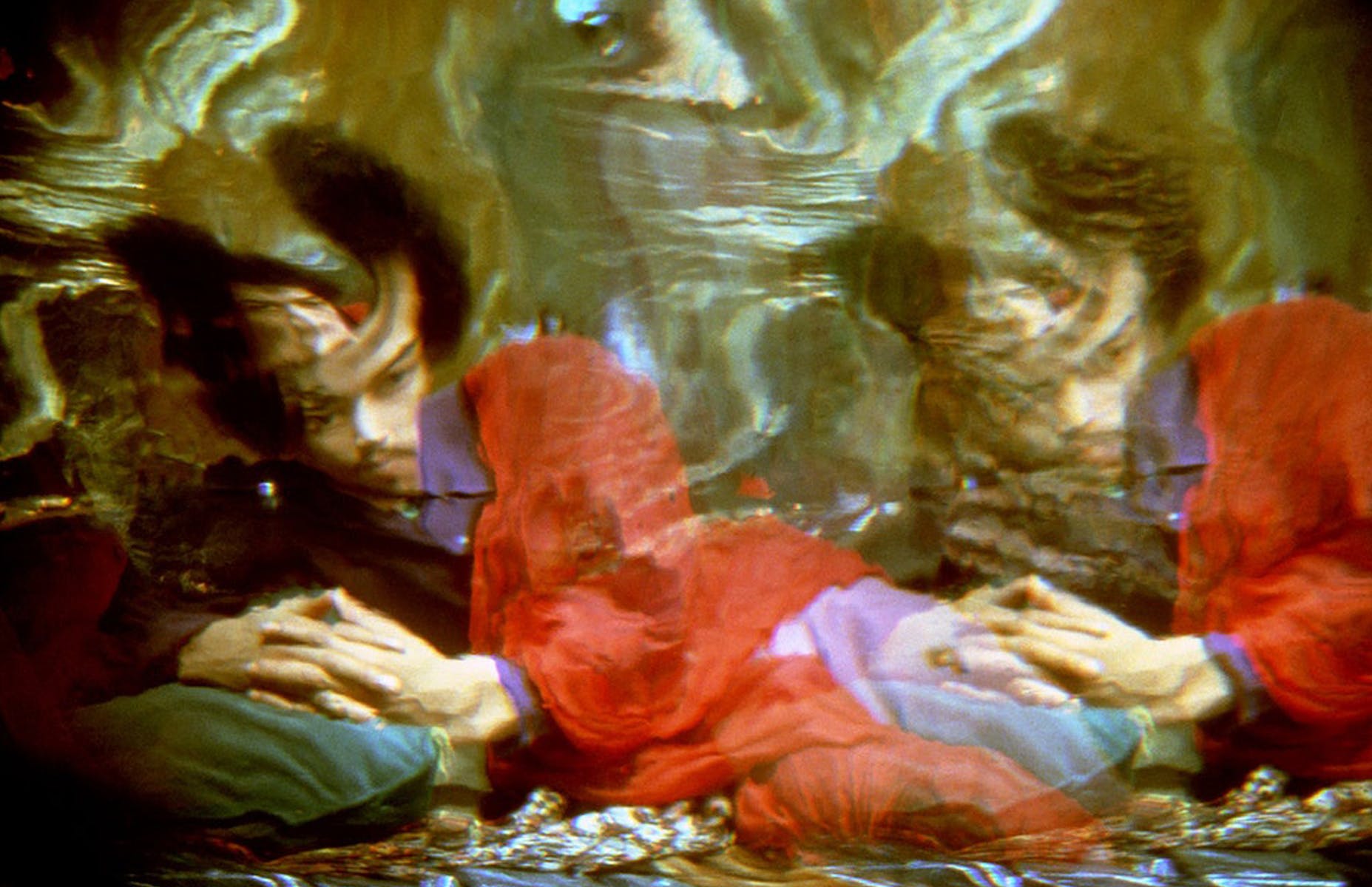 Blurry warped image of man laying down