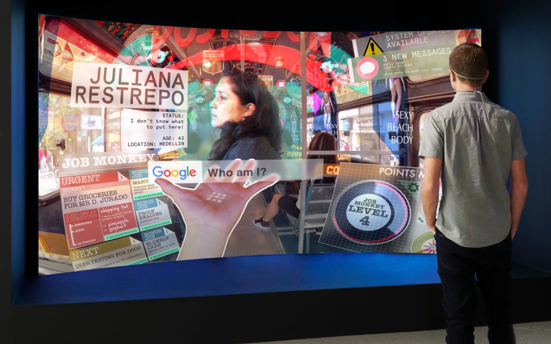 Man standing in front of large rounded projection screen displaying a futuristic user interface