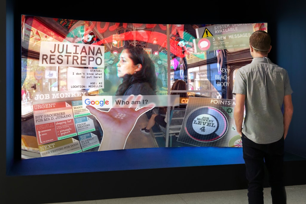 Image of visitor watching a movie projected on a rounded screen