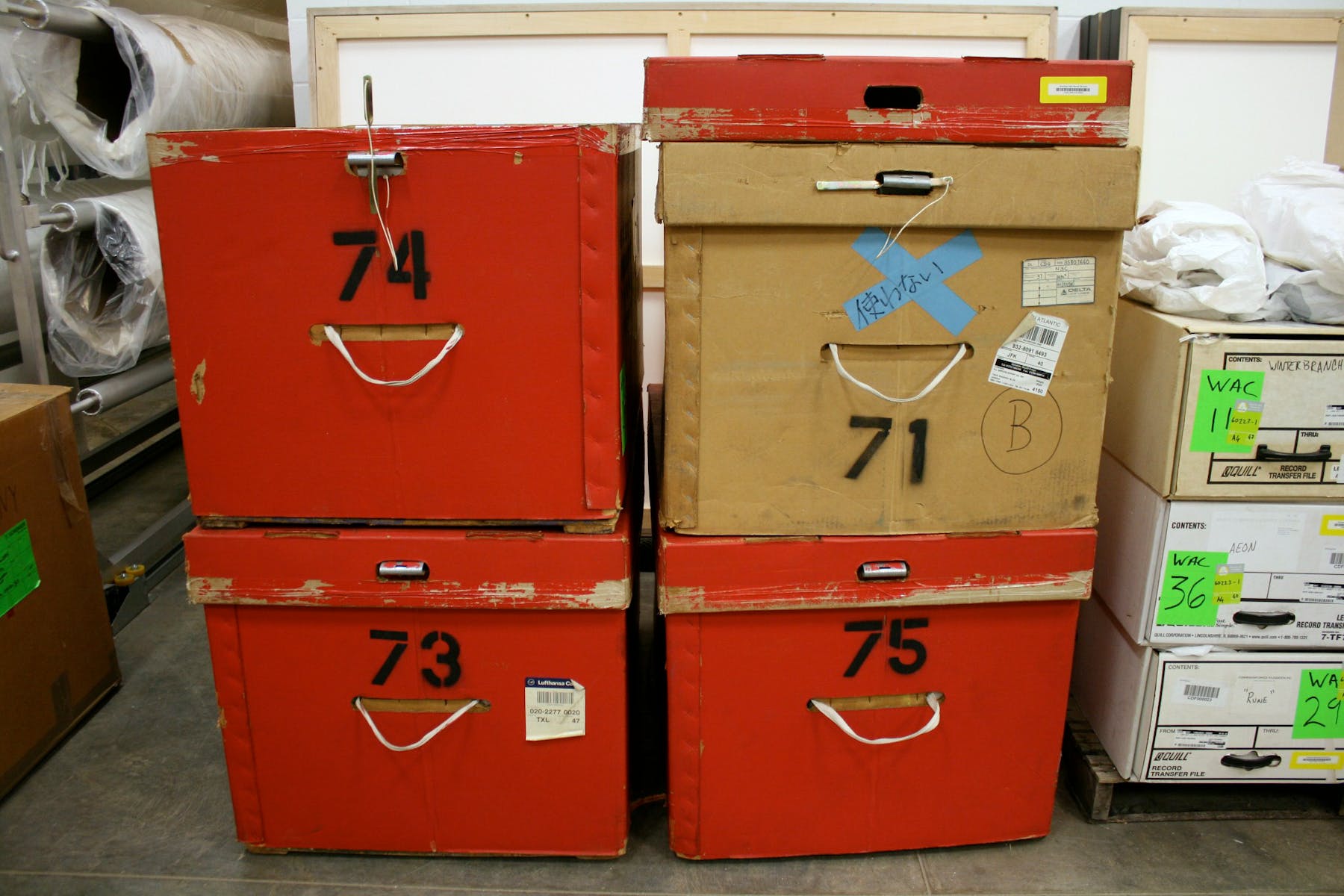 Costume boxes from the Cunningham Dance Foundation’s New York facilities and their contents were sorted and cataloged in the Walker’s painting storage room.
