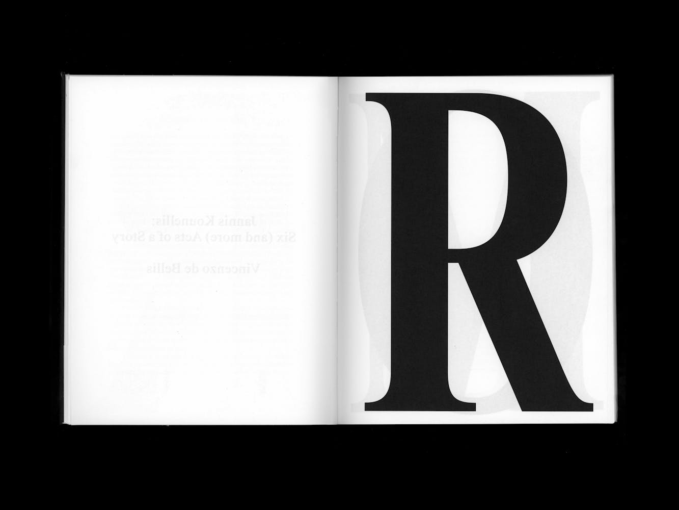 Book spread witha large letter R.