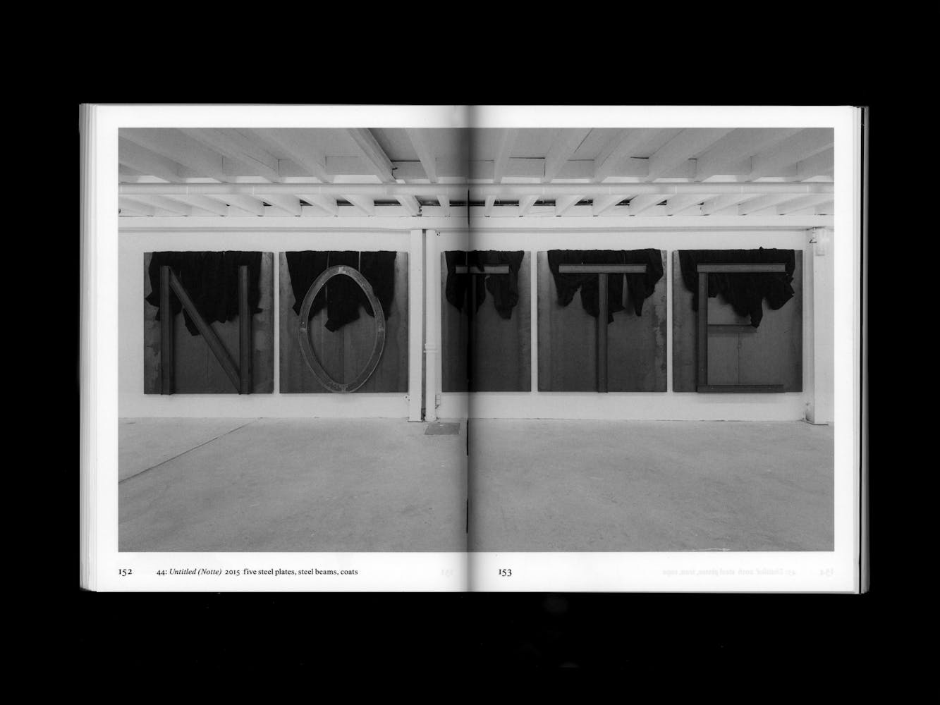 Spread of a book with pictures of artwork.