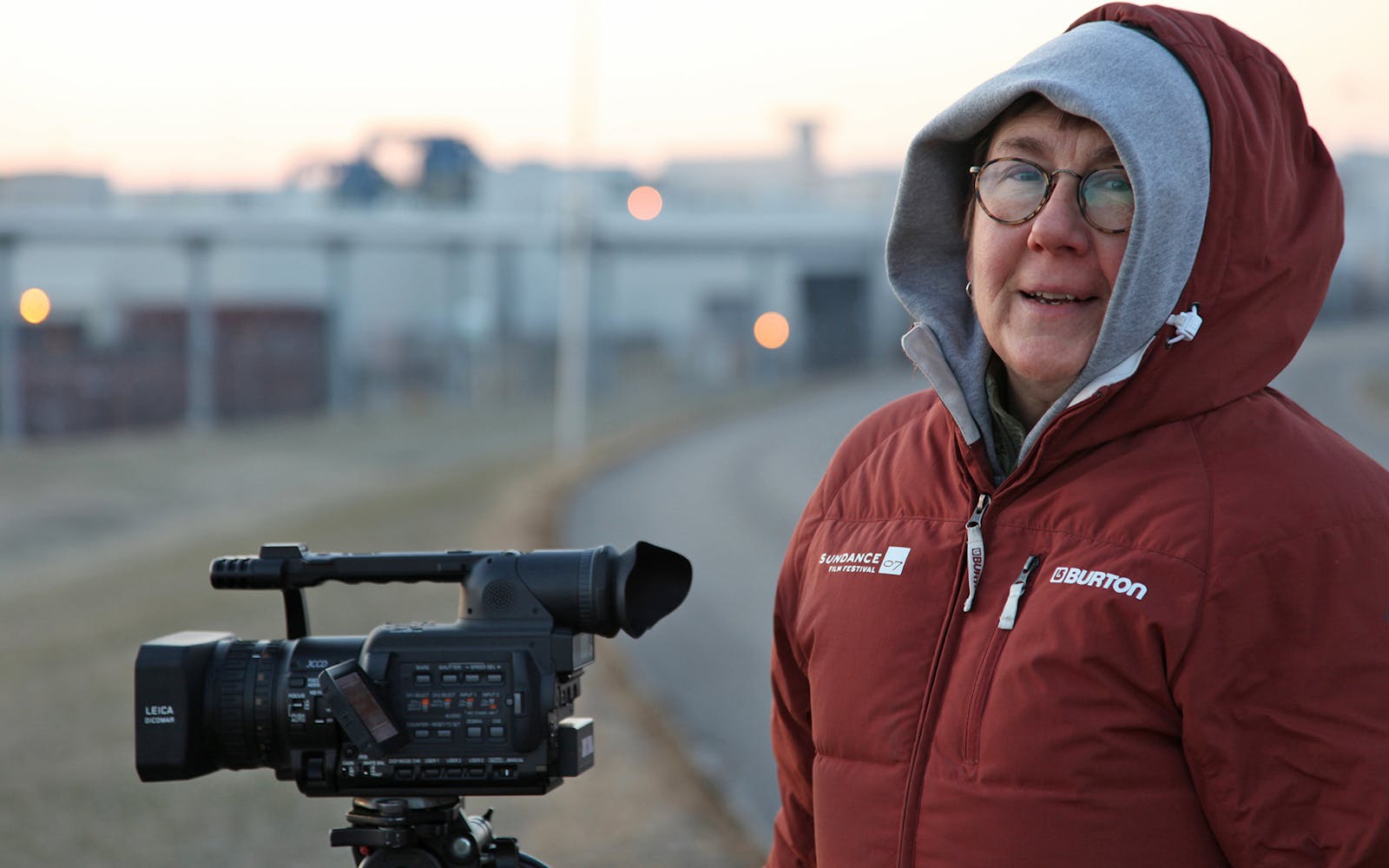 Julia Reichert in front of film camera.