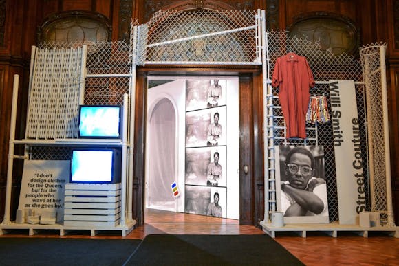 Exhibition comprised of images, monitors, and chainlink fencing
