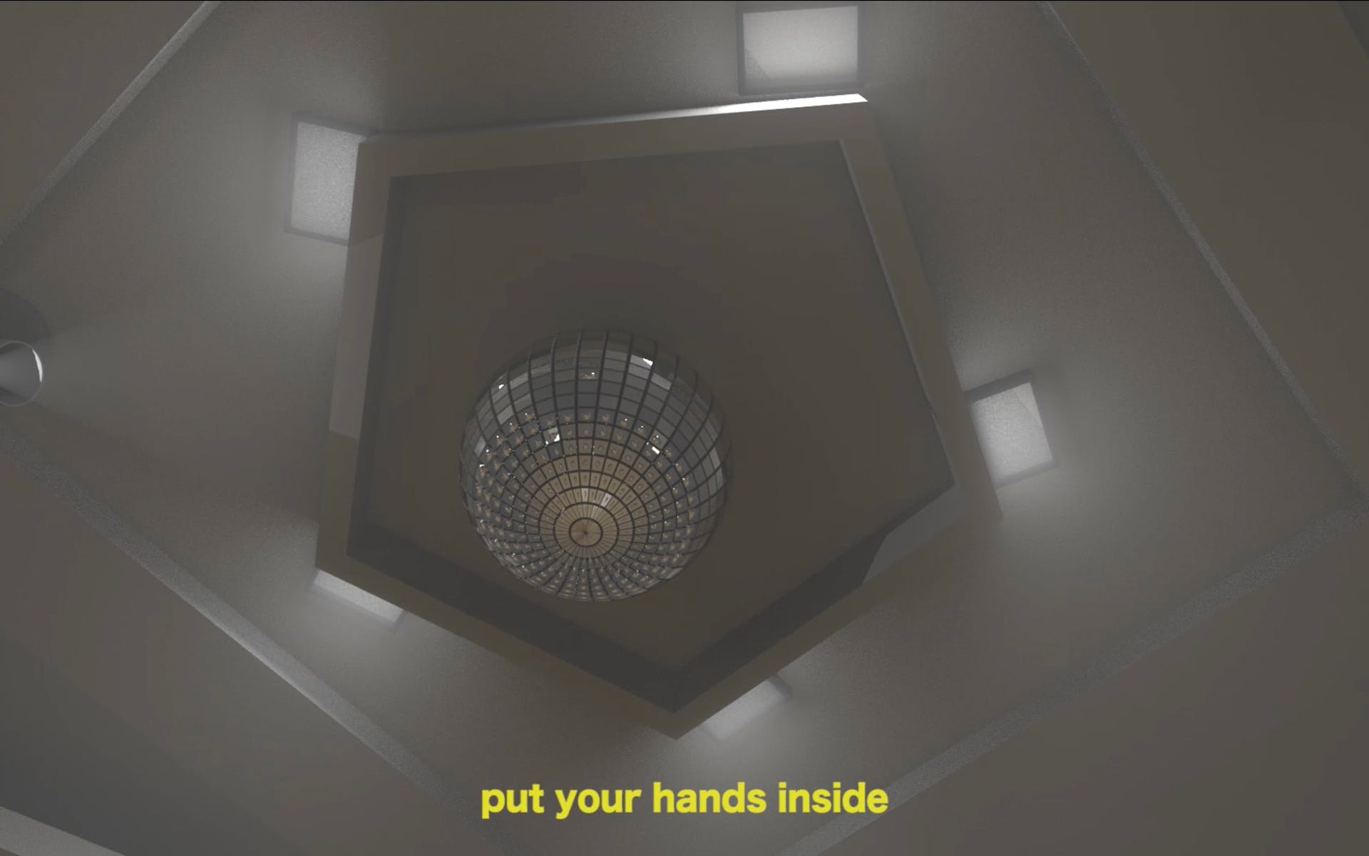 A view looking up at disco ball on a ceiling. Caption below reads: "put your hands inside"
