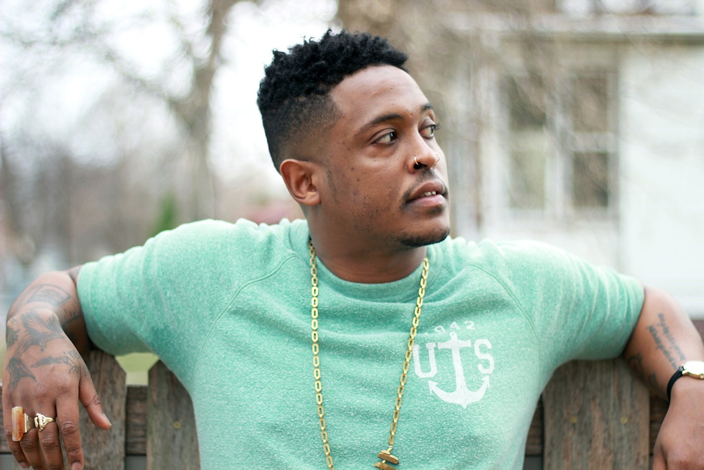 Danez Smith in a green shirt.