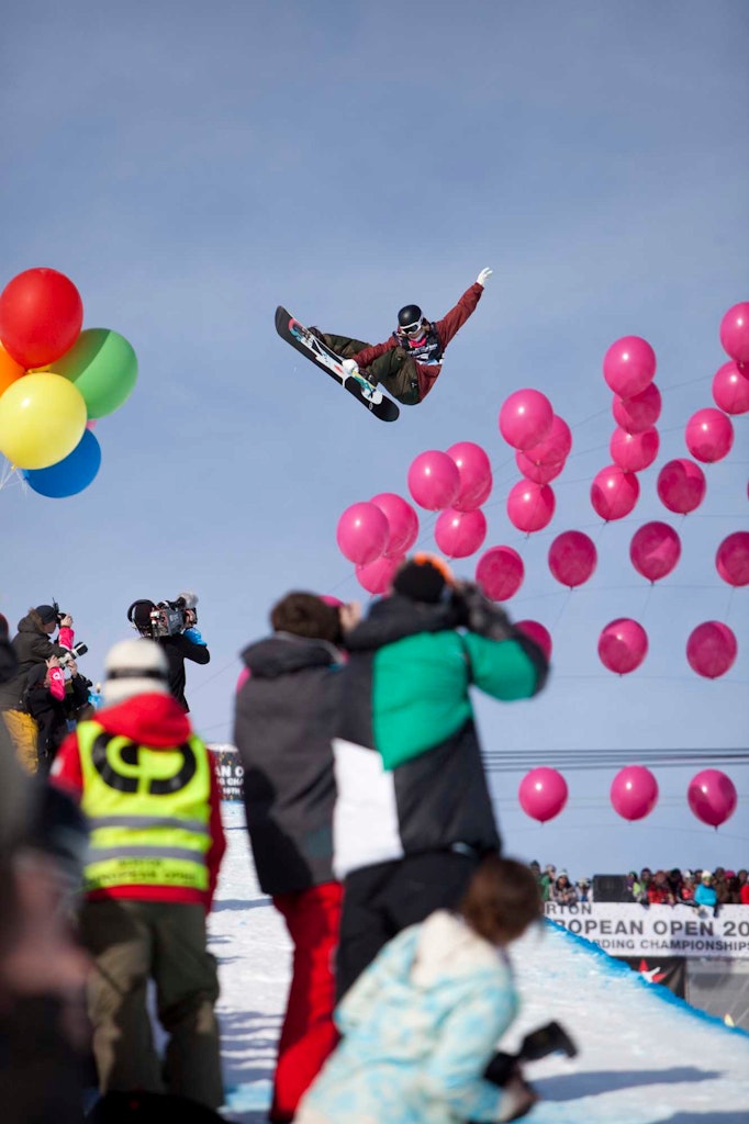 Snowboarders and balloons
