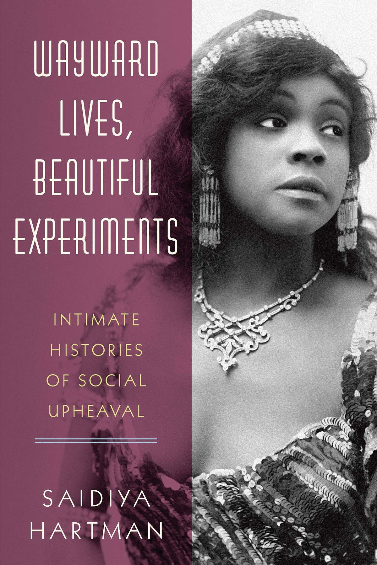 A book cover. On the left side of the cover is text on a purple background and on the right side is an image of an ornately dressed black woman.
