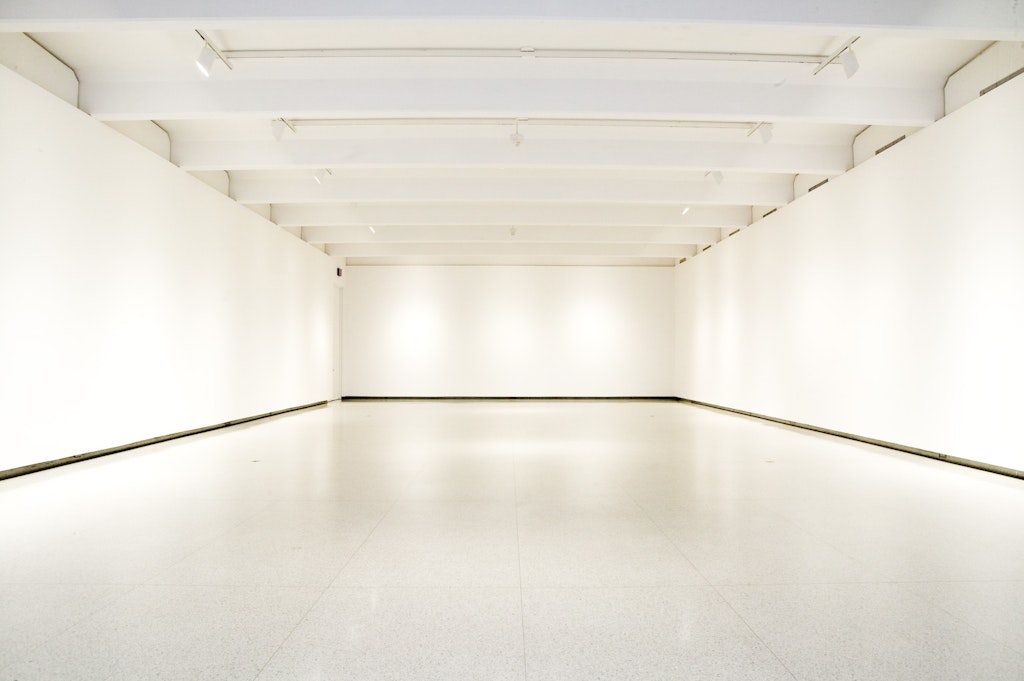 An empty white art gallery.