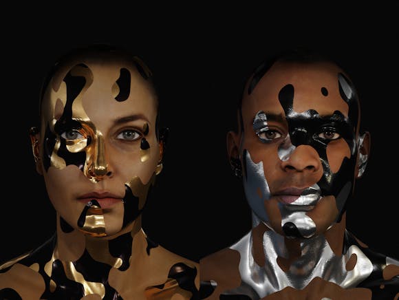 Image of woman and man with metallic camouflage-like face paint
