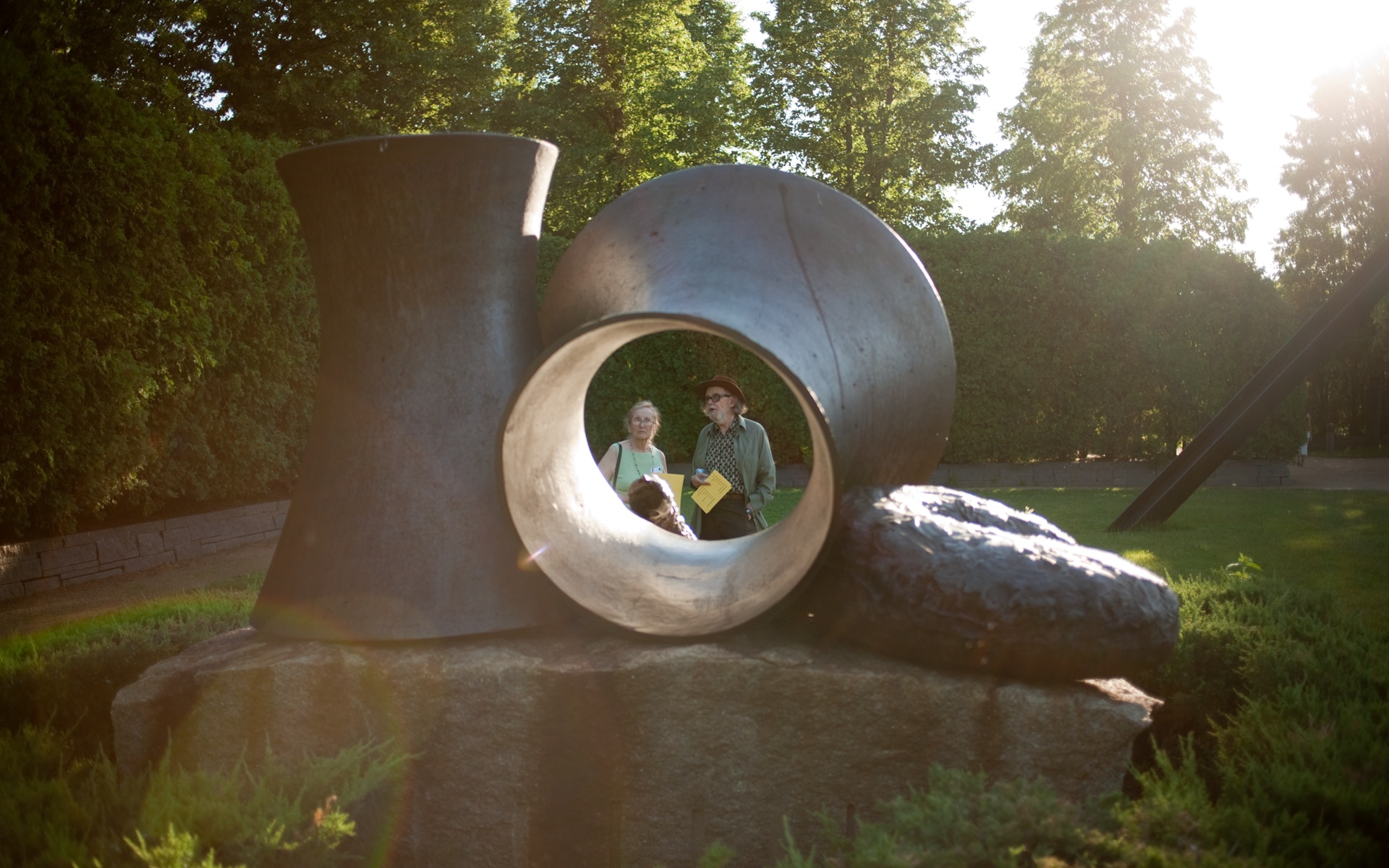 Two adults admire a sculpture in the Minneapolis Sculpture Garden.