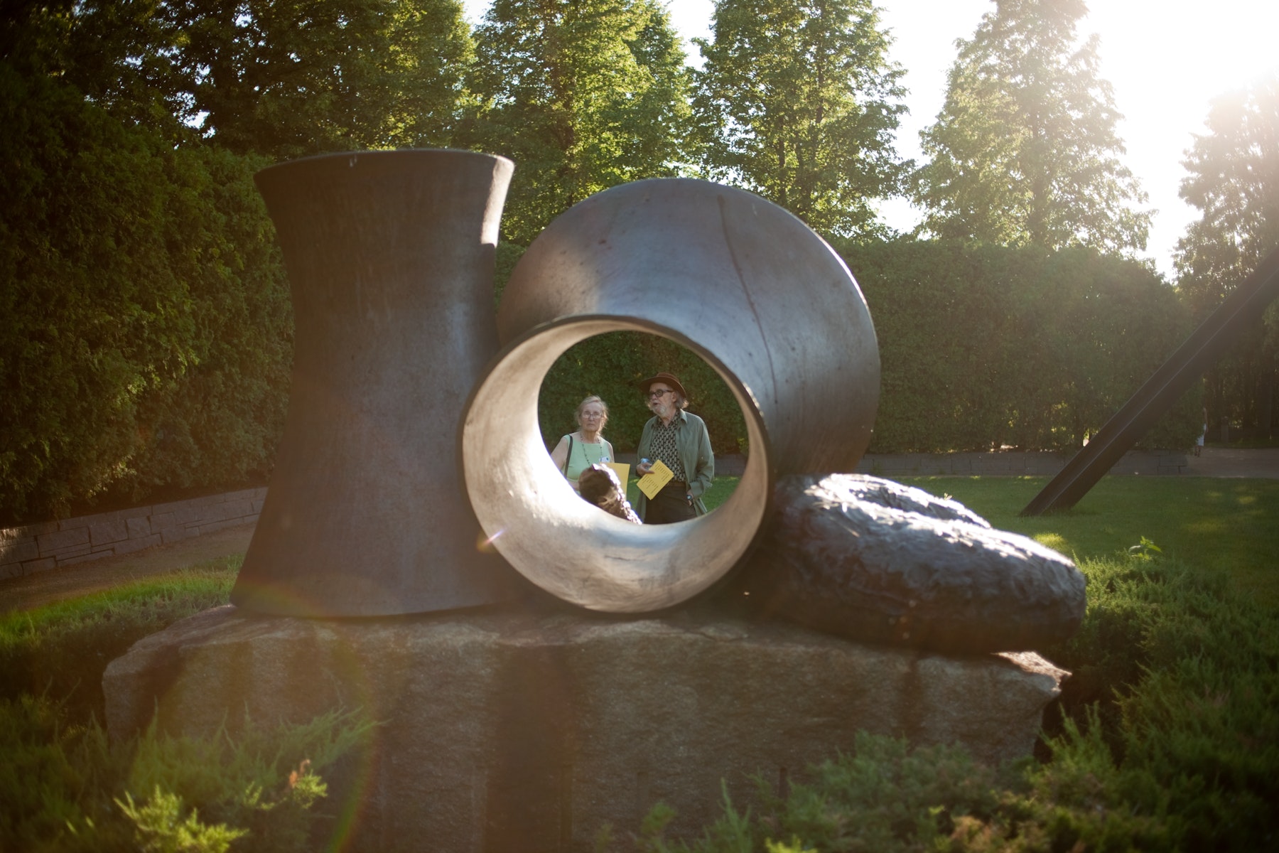 Two adults admire a sculpture in the Minneapolis Sculpture Garden.