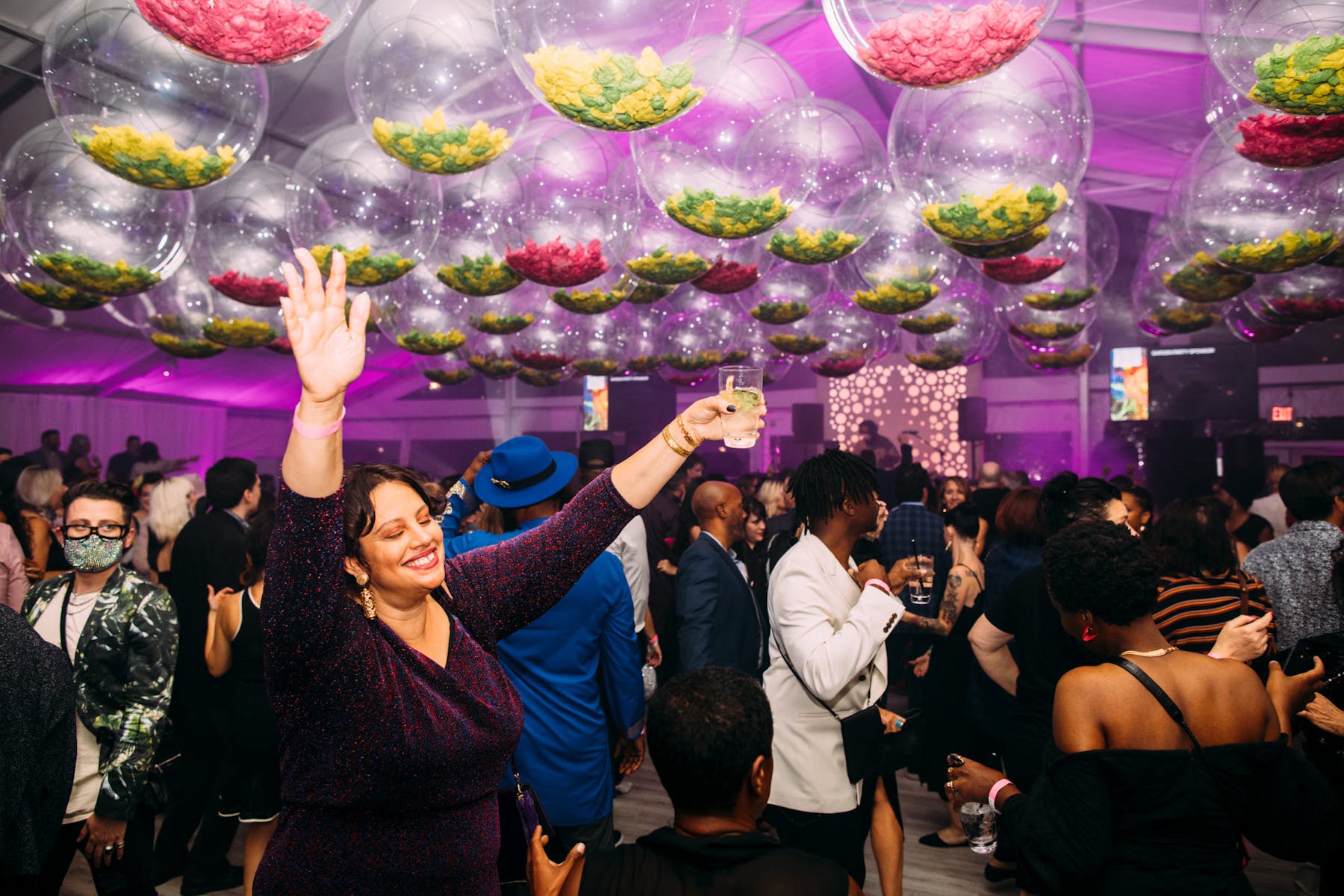 Peopel partying in a decorated room during Party in the Garden