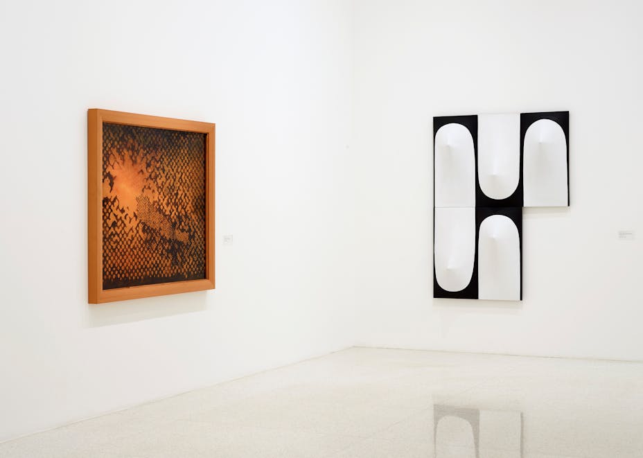 View of the exhibition 75 Gifts for 75 Years, 2015; (left to right): Sigmar Polke, ...solange die mit der Wirklichkeit verbindenden Beziehungen fehlen, 1998; Zilia Sánchez, Troyanas, políptico (de la serie Módulos Infinitos) [Trojans, polyptych (of the Infinite Modules series)], 1967