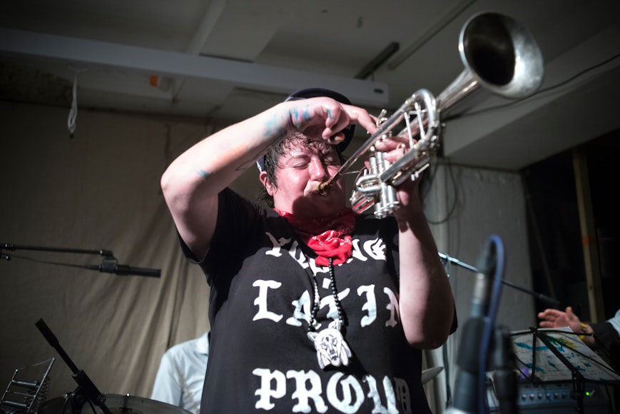 Image of trumpeter on stage performing