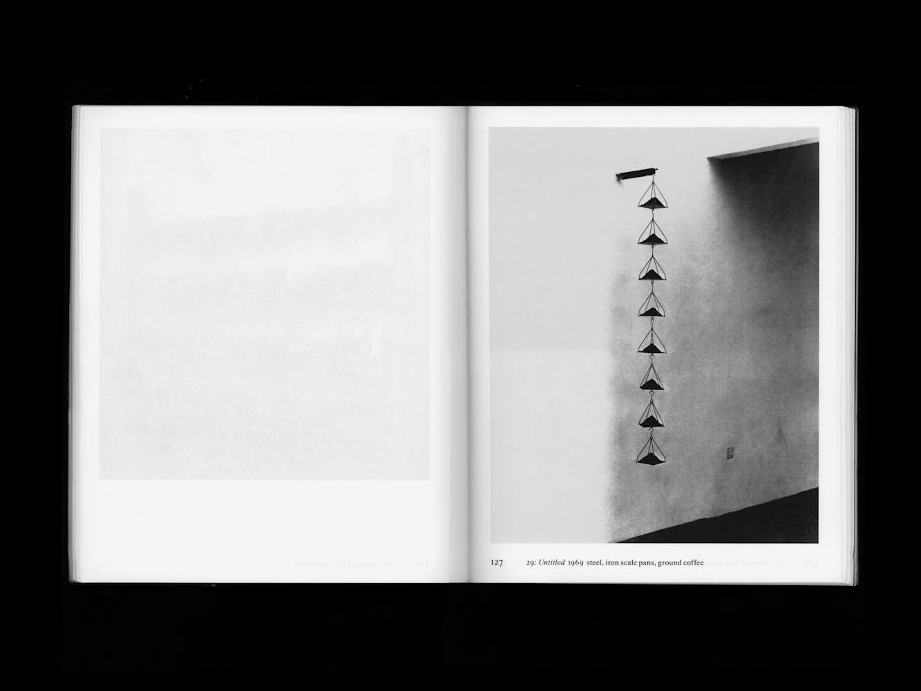 Spread of a book with pictures of artwork.