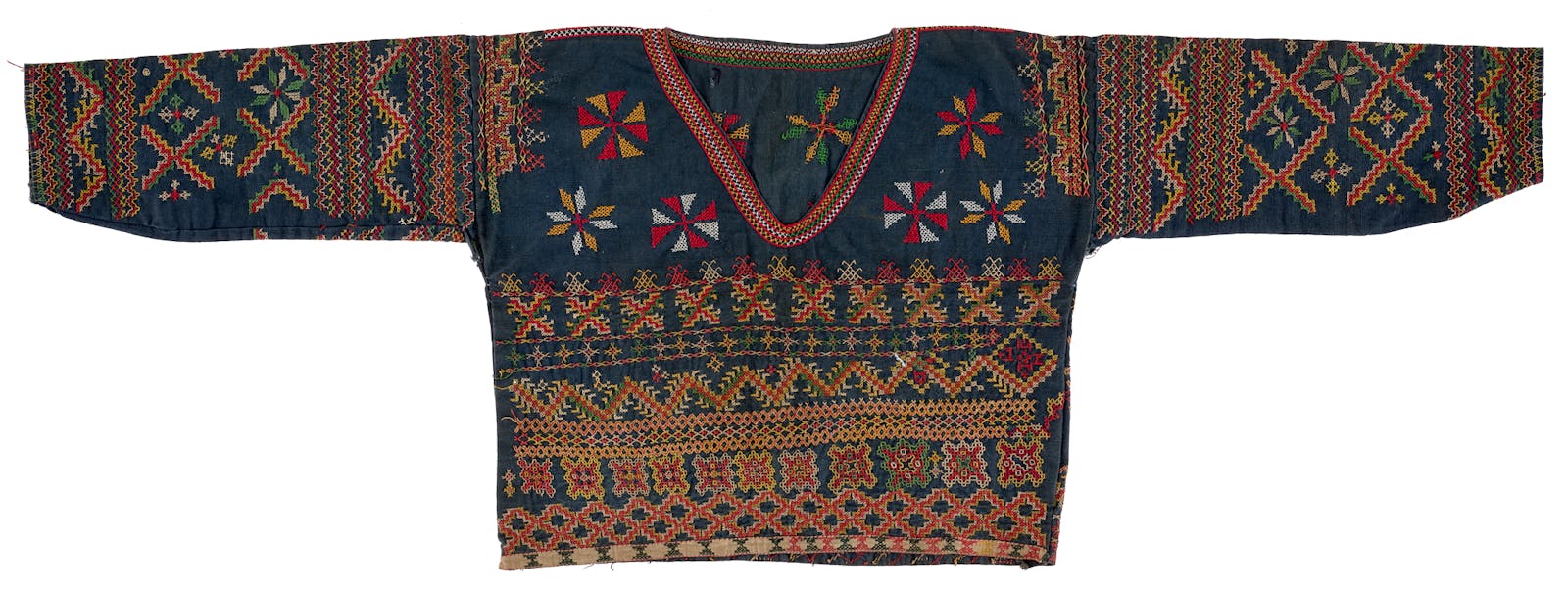 A men's long sleeve shirt like tunic with geometric patterns woven into it.