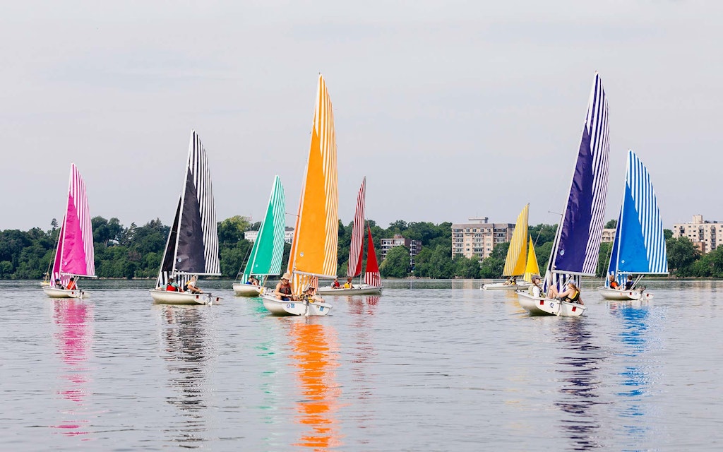 Sails reflecting on water