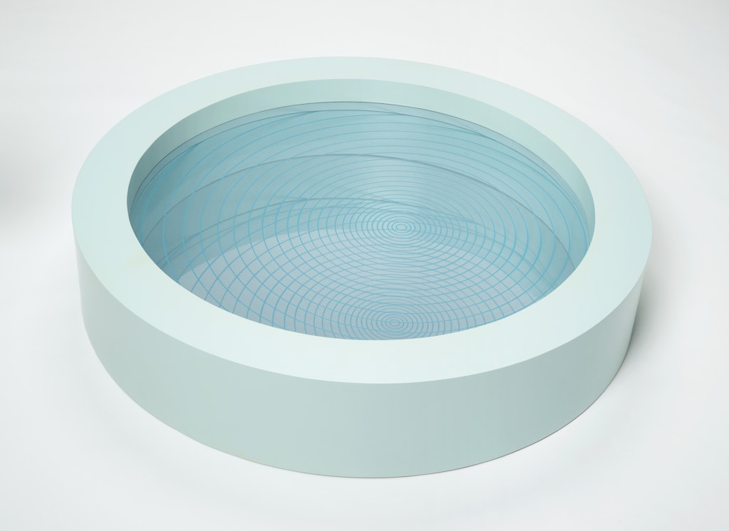 A blue round object on a table.