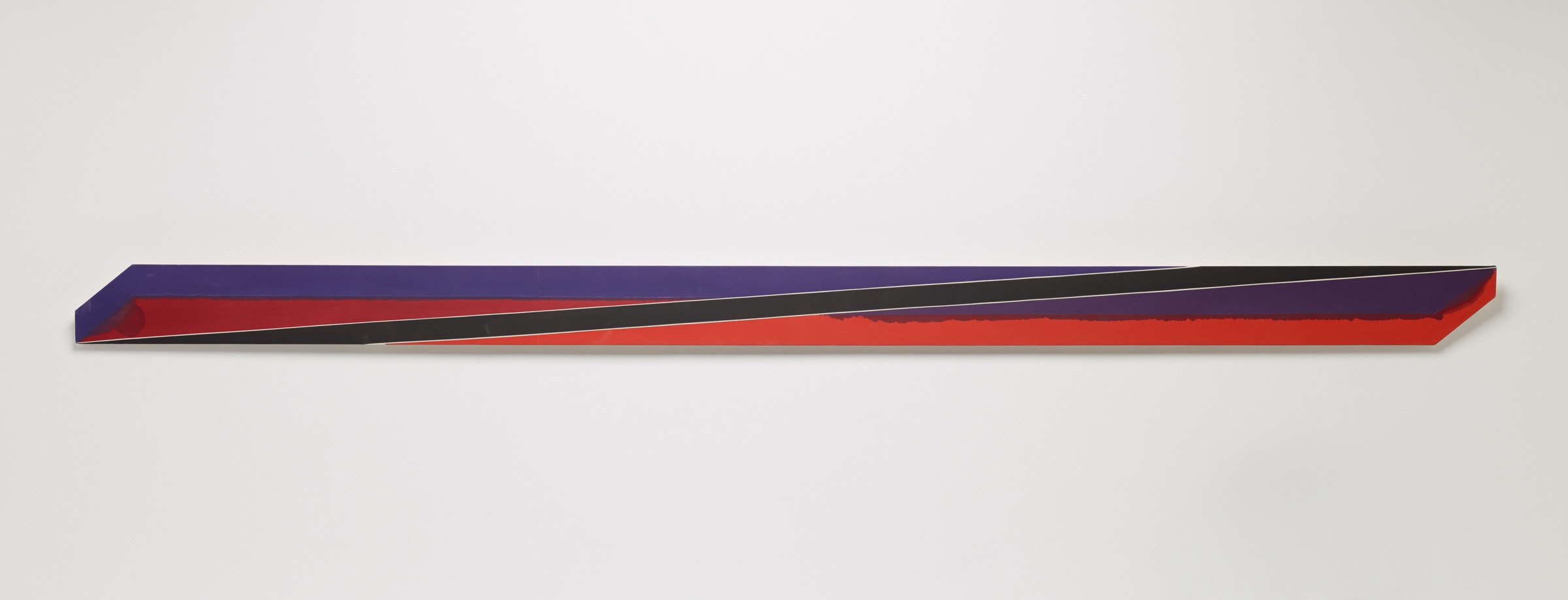 A red and blue rectangle objects sits in a white space.