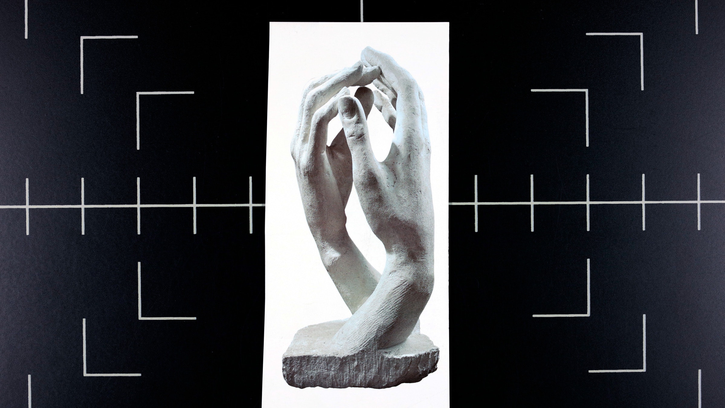 An image of a scuplture of hands