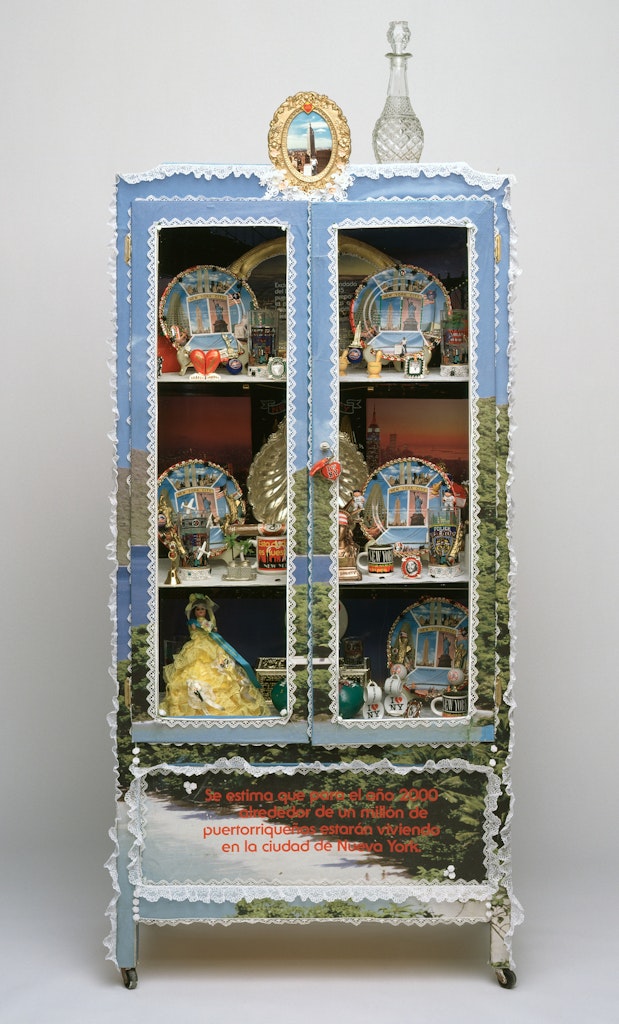 A ornimental display case with decorative plates.